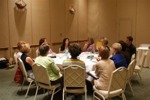 Rita Zamora (seen above in black sweater) co-presenting roundtable session "Social Media, A Timely Topic".  Teresa Duncan co-presenter is seated to the left of Rita Zamora.